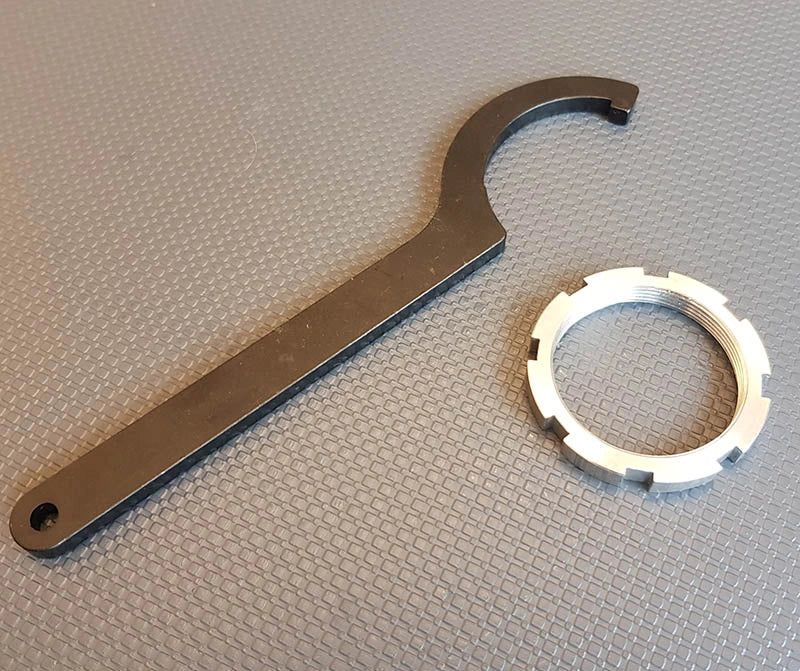 Ratchet nut and ratchet wrench for kick-out bearings (Adjustable)